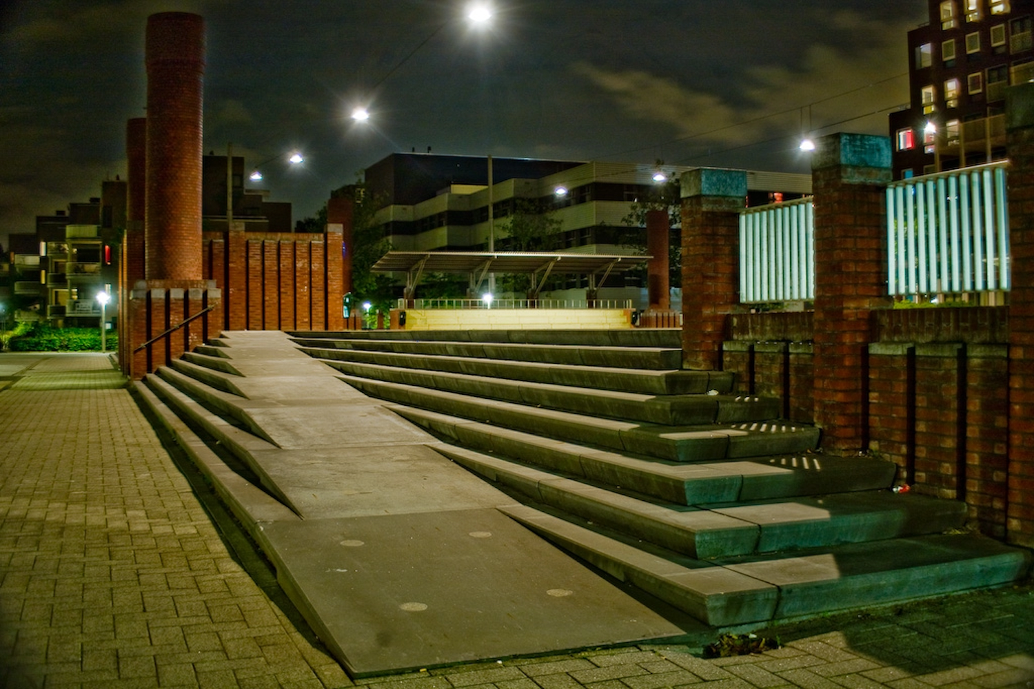 A single ramp with a gentle incline cutting across stone steps.